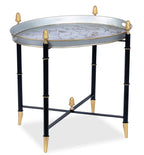 Table ronde en étain noir avec embouts dorés