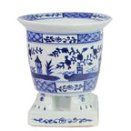 Jardinière sur pied bleu foncé et blanche avec motif de scène de village
